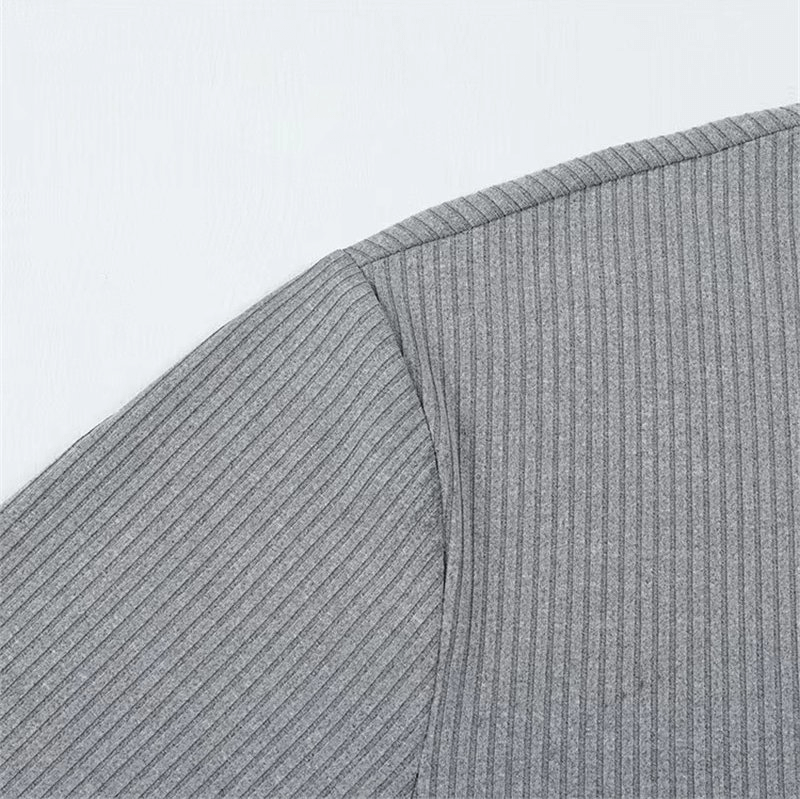 Close-up of gray striped fabric on Sports Quick Dry Men's Long Sleeve T-Shirt for gym use, highlighting stylish pattern and texture.